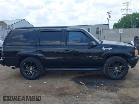 2000 Cadillac Escalade with VIN 1GYEK63R4YR200782, listed as a IAAI auction lot 42826338 with 250,610 mi miles and . Bid and sale history available at DreamBid. Image 13.