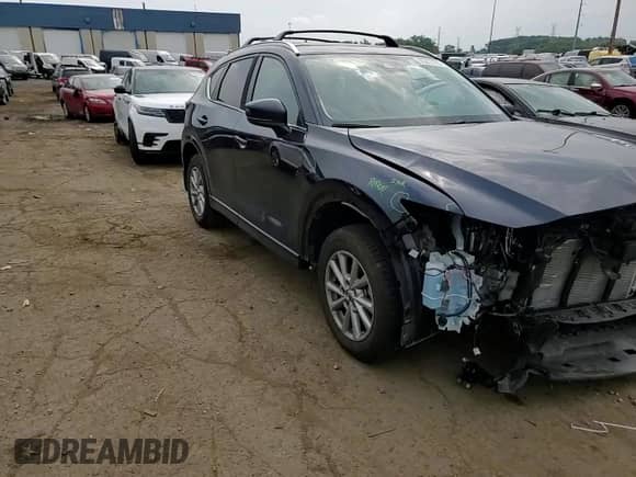 2024 Mazda CX-5 S Preferred z VIN JM3KFBCL0R0477637, wystawiony jako Copart lot #65215105 z przebiegiem 9 042 mil mil oraz Szkoda całkowita • Salvage title. Historia ofert i sprzedaży dostępna na DreamBid. Obrazek 13.