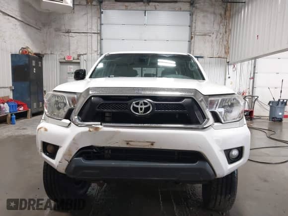 2014 Toyota Tacoma with VIN 3TMLU4EN8EM148737, listed as a IAAI auction lot 43256920 with 106,235 mi miles and . Bid and sale history available at DreamBid. Image 13.