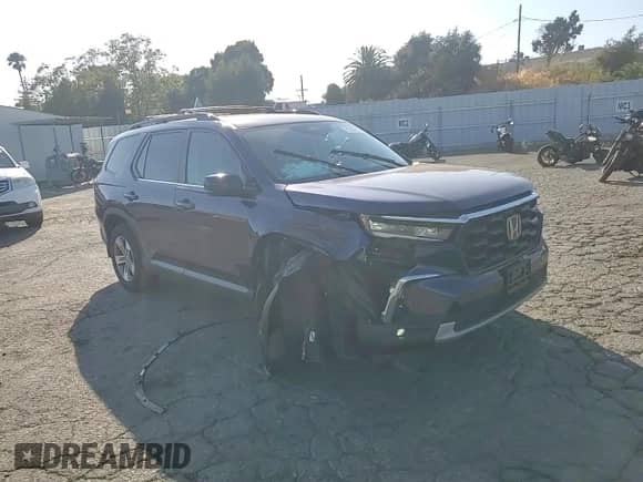 2025 Honda Pilot EX-L с VIN 5FNYG2H47SB016542, выставлен на аукционе Copart как лот 70500615 с пробегом 11 862 миль миль и Списание • Salvage title. История ставок и продаж доступна на DreamBid. Изображение 14.