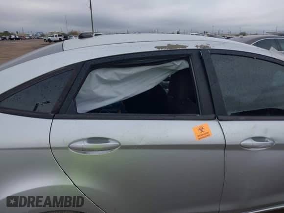 2015 Ford Fiesta SE with VIN 3FADP4BJ2FM220598, listed as a IAAI auction lot 41213342 with Not provided miles and . Bid and sale history available at DreamBid. Image 8.