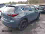 2022 Mazda CX-5 S Carbon Edition z VIN JM3KFBCM7N0579780, wystawiony jako IAAI lot #41460860 z przebiegiem 43 479 mil mil oraz . Historia ofert i sprzedaży dostępna na DreamBid. Obrazek 4.