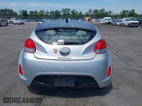 2012 Hyundai Veloster w/Gray Int z VIN KMHTC6AD0CU049684, wystawiony jako IAAI lot #43132772 z przebiegiem 114 146 mil mil oraz . Historia ofert i sprzedaży dostępna na DreamBid. Obrazek 16.