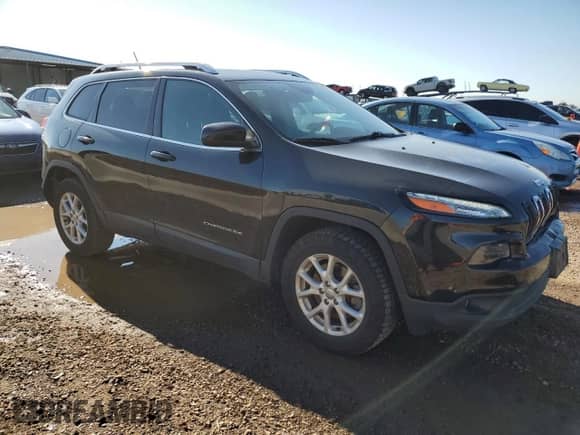 2014 Jeep Cherokee Latitude with VIN 1C4PJMCS9EW126037, listed as a Copart auction lot 81090325 with 86,721 mi miles and Salvage title. Bid and sale history available at DreamBid. Image 4.
