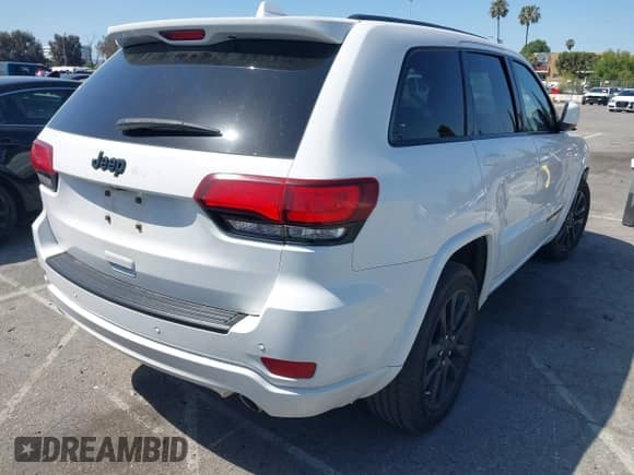 2019 Jeep Grand Cherokee Altitude with VIN 1C4RJEAG8KC832538, listed as a IAAI auction lot 41962224 with 104,321 mi miles and . Bid and sale history available at DreamBid. Image 4.