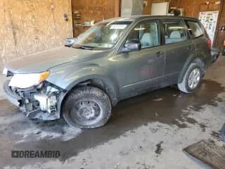 2009 Subaru Forester X with VIN JF2SH61699H772200, listed as a Copart auction lot 86614875 with 148,295 mi miles and Salvage title. Bid and sale history available at DreamBid. Image 1.