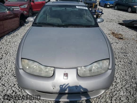 2001 Saturn SC with VIN 1G8ZR12711Z109068, listed as a Copart auction lot 72353914 with 116,559 mi miles and Salvage title. Bid and sale history available at DreamBid. Image 5.