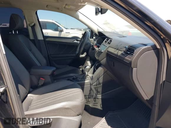 2022 Volkswagen Tiguan SE with VIN 3VV2B7AX3NM132957, listed as a IAAI auction lot 43105559 with 62,359 mi miles and . Bid and sale history available at DreamBid. Image 5.