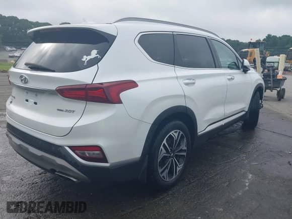 2020 Hyundai Santa Fe SEL with VIN 5NMS3CAA4LH176420, listed as a IAAI auction lot 42472600 with 59,221 mi miles and . Bid and sale history available at DreamBid. Image 4.