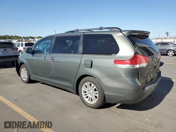 2014 Toyota Sienna XLE with VIN 5TDYK3DC8ES419415, listed as a Copart auction lot 81764575 with 168,345 mi miles and Salvage title. Bid and sale history available at DreamBid. Image 2.