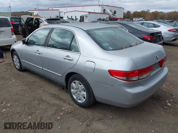 2003 Honda Accord LX with VIN 1HGCM56303A105833, listed as a IAAI auction lot 43488142 with 194,186 mi miles and . Bid and sale history available at DreamBid. Image 3.