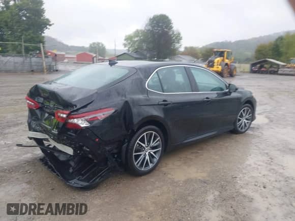 2023 Toyota Camry Hybrid XLE with VIN 4T1F31AK7PU602464, listed as a IAAI auction lot 43392293 with 41,716 mi miles and . Bid and sale history available at DreamBid. Image 4.
