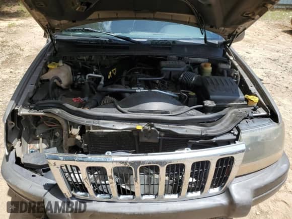 2001 Jeep Grand Cherokee Laredo с VIN 1J4GX48S41C710312, выставлен на аукционе Copart как лот 71602705 с пробегом 190 339 миль миль и На запчасти • Non repairable. История ставок и продаж доступна на DreamBid. Изображение 12.