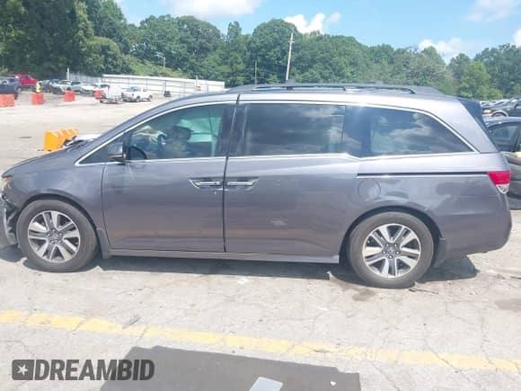 2015 Honda Odyssey Touring Elite с VIN 5FNRL5H98FB099305, выставлен на аукционе IAAI как лот 42880329 с пробегом 203 189 миль миль и . История ставок и продаж доступна на DreamBid. Изображение 14.