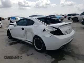 2007 Hyundai Tiburon GT с VIN KMHHN66F17U235198, выставлен на аукционе Copart как лот 70841514 с пробегом Не указан миль и Списание • Salvage title. История ставок и продаж доступна на DreamBid. Изображение 2.