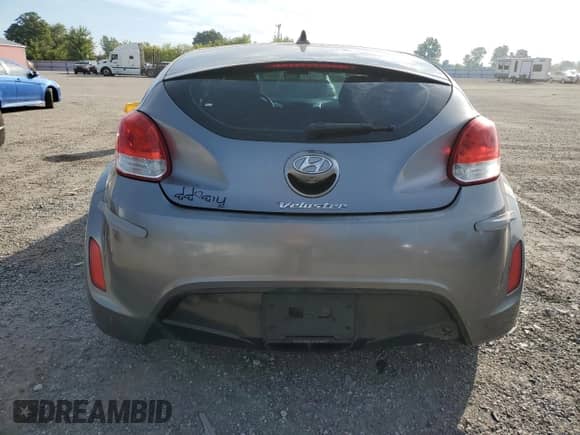 2012 Hyundai Veloster w/Black Int z VIN KMHTC6AD1CU081088, wystawiony jako Copart lot #71685565 z przebiegiem Nie podano mil oraz Szkoda całkowita • Salvage title. Historia ofert i sprzedaży dostępna na DreamBid. Obrazek 6.