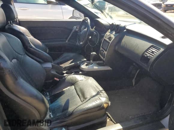 2003 Hyundai Tiburon GT с VIN KMHHN65F83U024950, выставлен на аукционе Copart как лот 70780994 с пробегом 178 681 миль миль и Списание • Salvage title. История ставок и продаж доступна на DreamBid. Изображение 10.