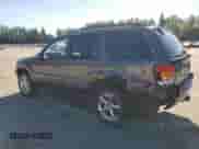 2002 Jeep Grand Cherokee Limited z VIN 1J8GW58J32C256389, wystawiony jako Copart lot #80217465 z przebiegiem 129 610 mil mil oraz Szkoda całkowita • Salvage title. Historia ofert i sprzedaży dostępna na DreamBid. Obrazek 2.