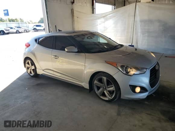 2014 Hyundai Veloster Turbo R-Spec с VIN KMHTC6AE9EU196937, выставлен на аукционе Copart как лот 70386975 с пробегом 150 522 миль миль и Чистый • Clean title. История ставок и продаж доступна на DreamBid. Изображение 4.