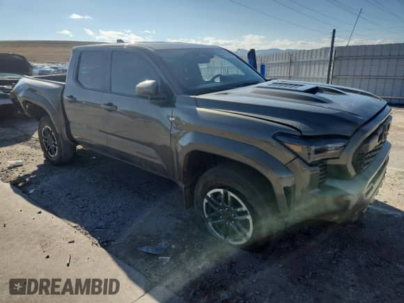 2024 Toyota Tacoma TRD Sport with VIN 3TMLB5JN4RM049470, listed as a Copart auction lot 81793685 with 7,521 mi miles and Salvage title. Bid and sale history available at DreamBid. Image 4.