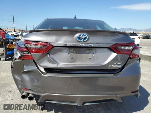 2021 Toyota Camry Hybrid XSE with VIN 4T1K31AK9MU565539, listed as a Copart auction lot 86149585 with 115,658 mi miles and Salvage title. Bid and sale history available at DreamBid. Image 6.