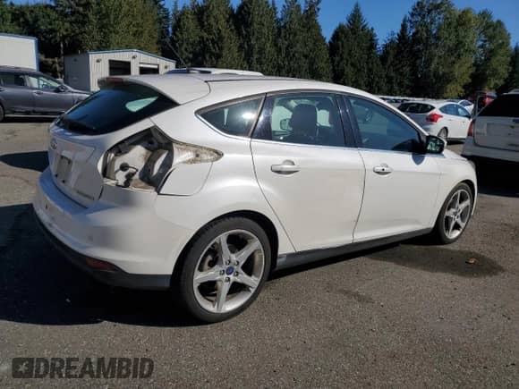 2012 Ford Focus Titanium с VIN 1FAHP3N25CL356687, выставлен на аукционе Copart как лот 81436495 с пробегом 108 483 миль миль и Списание • Salvage title. История ставок и продаж доступна на DreamBid. Изображение 3.