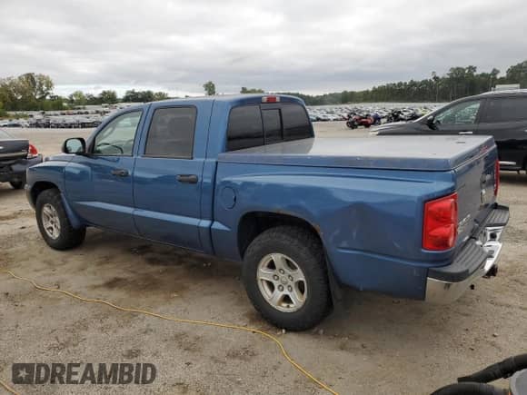 2005 Dodge Dakota SLT with VIN 1D7HW48N25S269367, listed as a Copart auction lot 83964315 with 119,851 mi miles and Clean title. Bid and sale history available at DreamBid. Image 2.