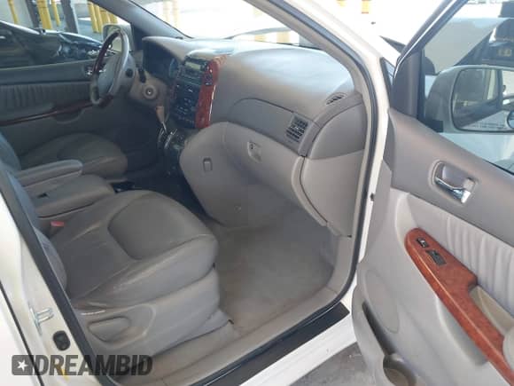 2004 Toyota Sienna XLE z VIN 5TDZA22C94S054651, wystawiony jako IAAI lot #42943588 z przebiegiem 242 458 mil mil oraz . Historia ofert i sprzedaży dostępna na DreamBid. Obrazek 5.