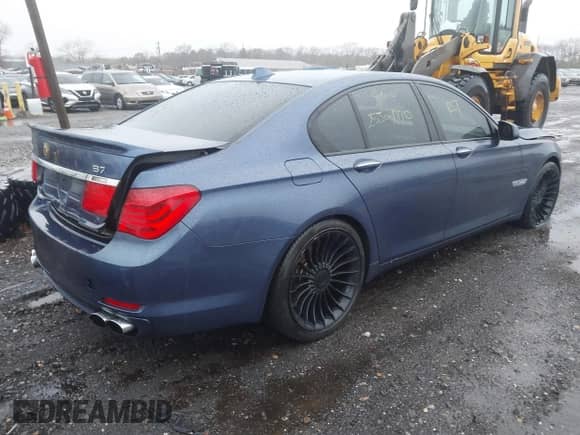2012 BMW 7 Series 750i z VIN WBAKA8C52CC447019, wystawiony jako IAAI lot #41727599 z przebiegiem Nie podano mil oraz . Historia ofert i sprzedaży dostępna na DreamBid. Obrazek 4.
