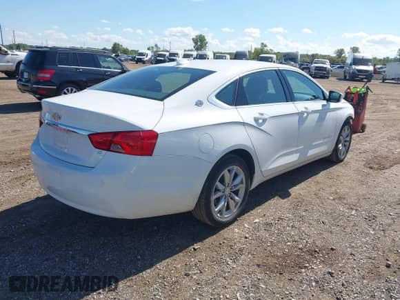 2016 Chevrolet Impala LT with VIN 2G1105SAXG9204577, listed as a IAAI auction lot 43327701 with 113,239 mi miles and . Bid and sale history available at DreamBid. Image 4.