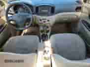 2006 Hyundai Accent GLS z VIN KMHCN46C36U040755, wystawiony jako Copart lot #86664095 z przebiegiem 226 111 mil mil oraz Szkoda całkowita • Salvage title. Historia ofert i sprzedaży dostępna na DreamBid. Obrazek 8.