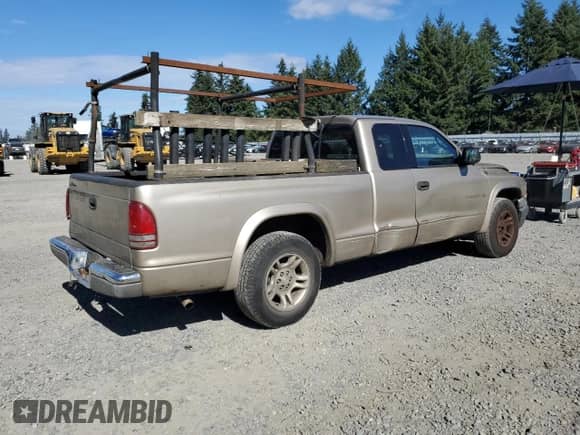 2002 Dodge Dakota SLT с VIN 1B7GL42X62S513428, выставлен на аукционе Copart как лот 81782275 с пробегом 201 494 миль миль и Списание • Salvage title. История ставок и продаж доступна на DreamBid. Изображение 3.