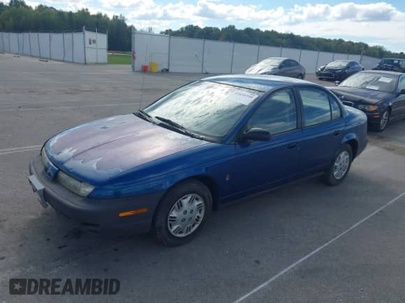 1999 Saturn SL с VIN 1G8ZH5285XZ366231, выставлен на аукционе IAAI как лот 43435350 с пробегом 200 293 миль миль и . История ставок и продаж доступна на DreamBid. Изображение 2.
