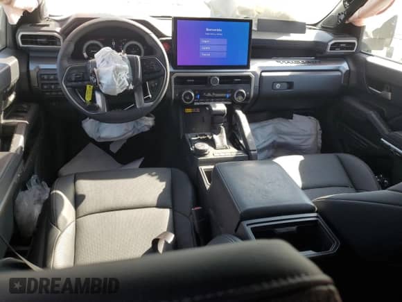 2024 Toyota Tacoma SR5 with VIN 3TMLB5JN4RM050957, listed as a Copart auction lot 71130595 with 1,873 mi miles and Salvage title. Bid and sale history available at DreamBid. Image 8.