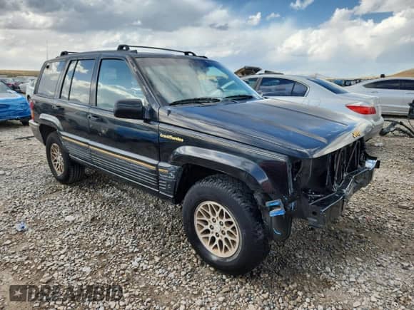 1993 Jeep Grand Cherokee Limited z VIN 1J4GZ78Y5PC544956, wystawiony jako Copart lot #84659285 z przebiegiem 153 945 mil mil oraz Szkoda całkowita • Salvage title. Historia ofert i sprzedaży dostępna na DreamBid. Obrazek 4.