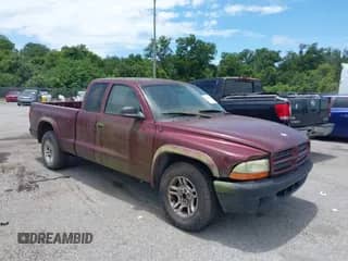 2003 Dodge Dakota with VIN 1D7HL12X93S351806, listed as a IAAI auction lot 42601206 with 165,192 mi miles and . Bid and sale history available at DreamBid. Image 1.