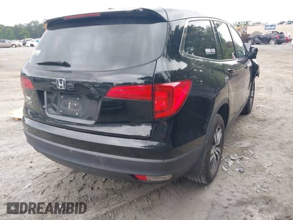 2017 Honda Pilot EX-L with VIN 5FNYF5H61HB018057, listed as a IAAI auction lot 42422940 with 117,111 mi miles and . Bid and sale history available at DreamBid. Image 4.