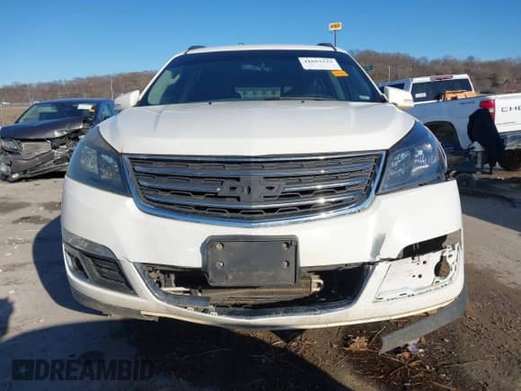 2013 Chevrolet Traverse LT z VIN 1GNKVJKD4DJ192000, wystawiony jako IAAI lot #41653233 z przebiegiem 249 929 mil mil oraz . Historia ofert i sprzedaży dostępna na DreamBid. Obrazek 13.