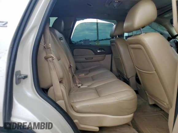 2011 Chevrolet Tahoe LTZ z VIN 1GNSCCE05BR399147, wystawiony jako Copart lot #64113585 z przebiegiem Nie podano mil oraz Szkoda całkowita • Salvage title. Historia ofert i sprzedaży dostępna na DreamBid. Obrazek 11.