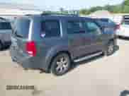 2010 Honda Pilot Touring with VIN 5FNYF4H88AB012001, listed as a IAAI auction lot 42635771 with 287,115 mi miles and . Bid and sale history available at DreamBid. Image 4.