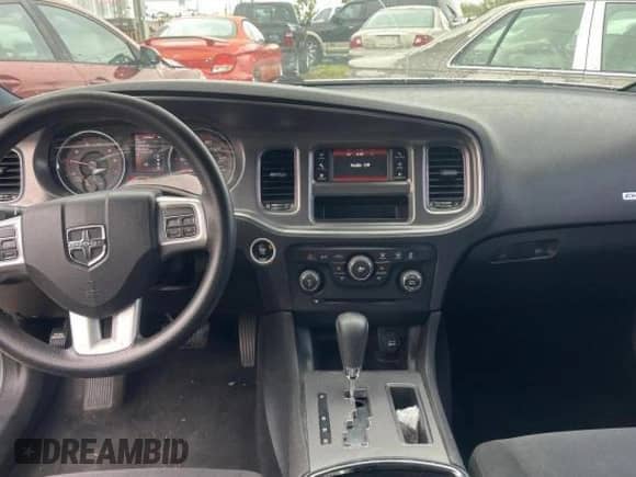 2014 Dodge Charger SE z VIN 2C3CDXBG0EH174937, wystawiony jako Copart lot #70931305 z przebiegiem 123 758 mil mil oraz Czysty tytuł • Clean title. Historia ofert i sprzedaży dostępna na DreamBid. Obrazek 9.