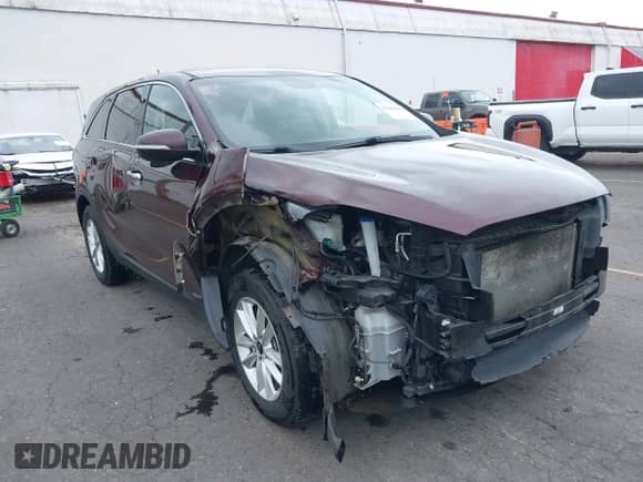 2019 Kia Sorento S z VIN 5XYPGDA57KG499100, wystawiony jako IAAI lot #42498893 z przebiegiem 69 311 mil mil oraz . Historia ofert i sprzedaży dostępna na DreamBid. Obrazek 1.