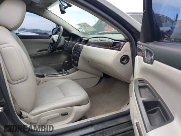 2013 Chevrolet Impala LTZ with VIN 2G1WC5E38D1244192, listed as a IAAI auction lot 43216599 with Not provided miles and . Bid and sale history available at DreamBid. Image 5.