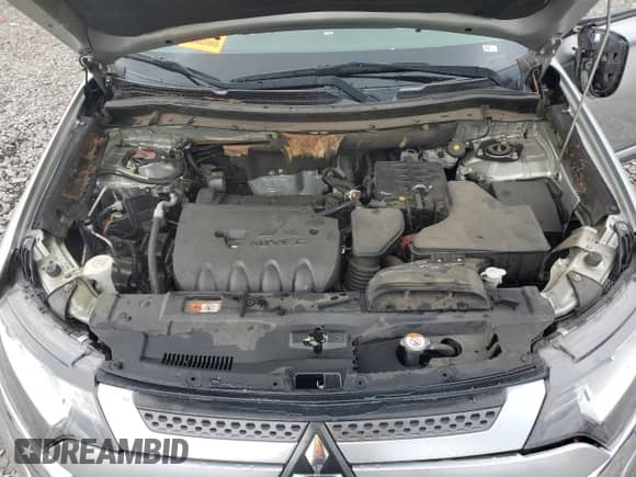 2020 Mitsubishi Outlander SE z VIN JA4AD3A31LZ039967, wystawiony jako Copart lot #82301135 z przebiegiem 109 992 mil mil oraz Szkoda całkowita • Salvage title. Historia ofert i sprzedaży dostępna na DreamBid. Obrazek 12.