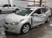 2013 Hyundai Elantra GLS z VIN 5NPDH4AE6DH300890, wystawiony jako IAAI lot #43073166 z przebiegiem 163 666 mil mil oraz . Historia ofert i sprzedaży dostępna na DreamBid. Obrazek 2.