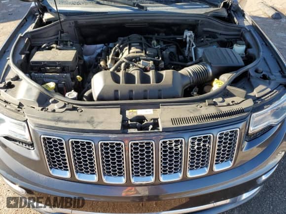 2014 Jeep Grand Cherokee Summit с VIN 1C4RJFJT4EC408510, выставлен на аукционе Copart как лот 82128615 с пробегом 91 710 миль миль и Списание • Salvage title. История ставок и продаж доступна на DreamBid. Изображение 12.