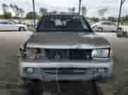 2000 Honda Passport LX with VIN 4S6CK58W3Y4401322, listed as a Copart auction lot 70466595 with 189,630 mi miles and Salvage title. Bid and sale history available at DreamBid. Image 5.