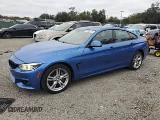 2019 BMW 4 Series 430i xDrive with VIN WBA4J3C54KBL10597, listed as a Copart auction lot 85931215 with 63,797 mi miles and Clean title. Bid and sale history available at DreamBid. Image 1.