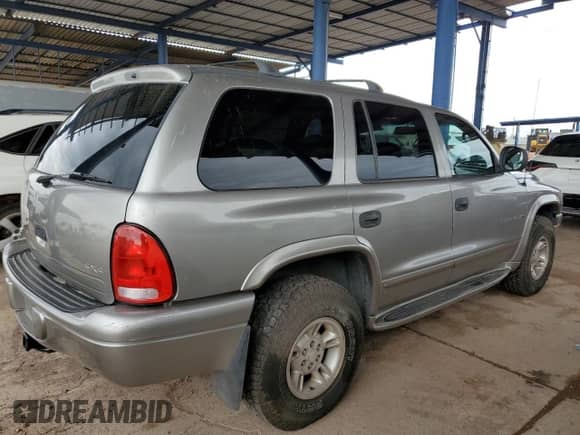 1999 Dodge Durango with VIN 1B4HS28Y8XF627388, listed as a Copart auction lot 71213005 with 266,293 mi miles and Clean title. Bid and sale history available at DreamBid. Image 3.