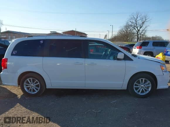 2019 Dodge Grand Caravan SXT with VIN 2C4RDGCG1KR672042, listed as a IAAI auction lot 41213183 with 160,019 mi miles and . Bid and sale history available at DreamBid. Image 13.